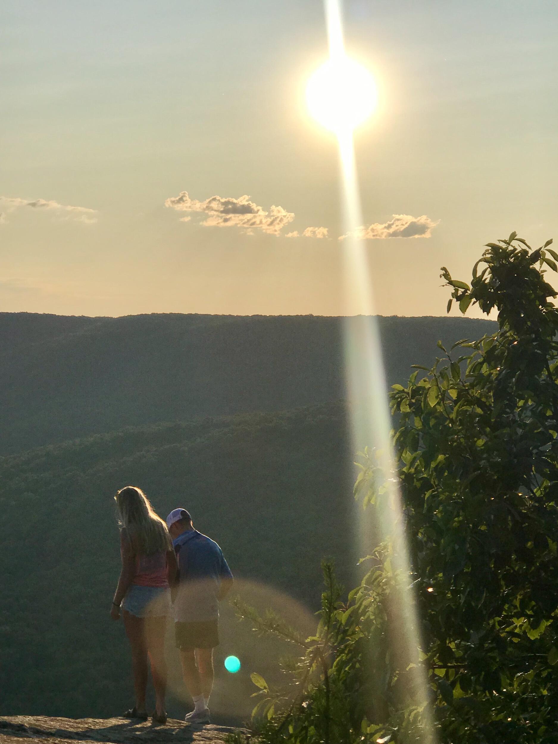 This beautiful overlook spot is called "Welch's Point" in Sparta, TN and is a very special place to Sam and Ashley. Back when they were young and in love, it became an adventure place. From late sunset runs, dinner sitting on the rocks, time with friends, or just simply taking a long truck drive to sing and dance to some music, Welch's Point holds some special memories. Sam first asked Ashley to be his girlfriend right on this very spot back in 2019, and then with life and learning... they later came back together to say "YES" to forever when Sam proposed for her hand in marriage in 2023. BEST. DAY. EVER!! 