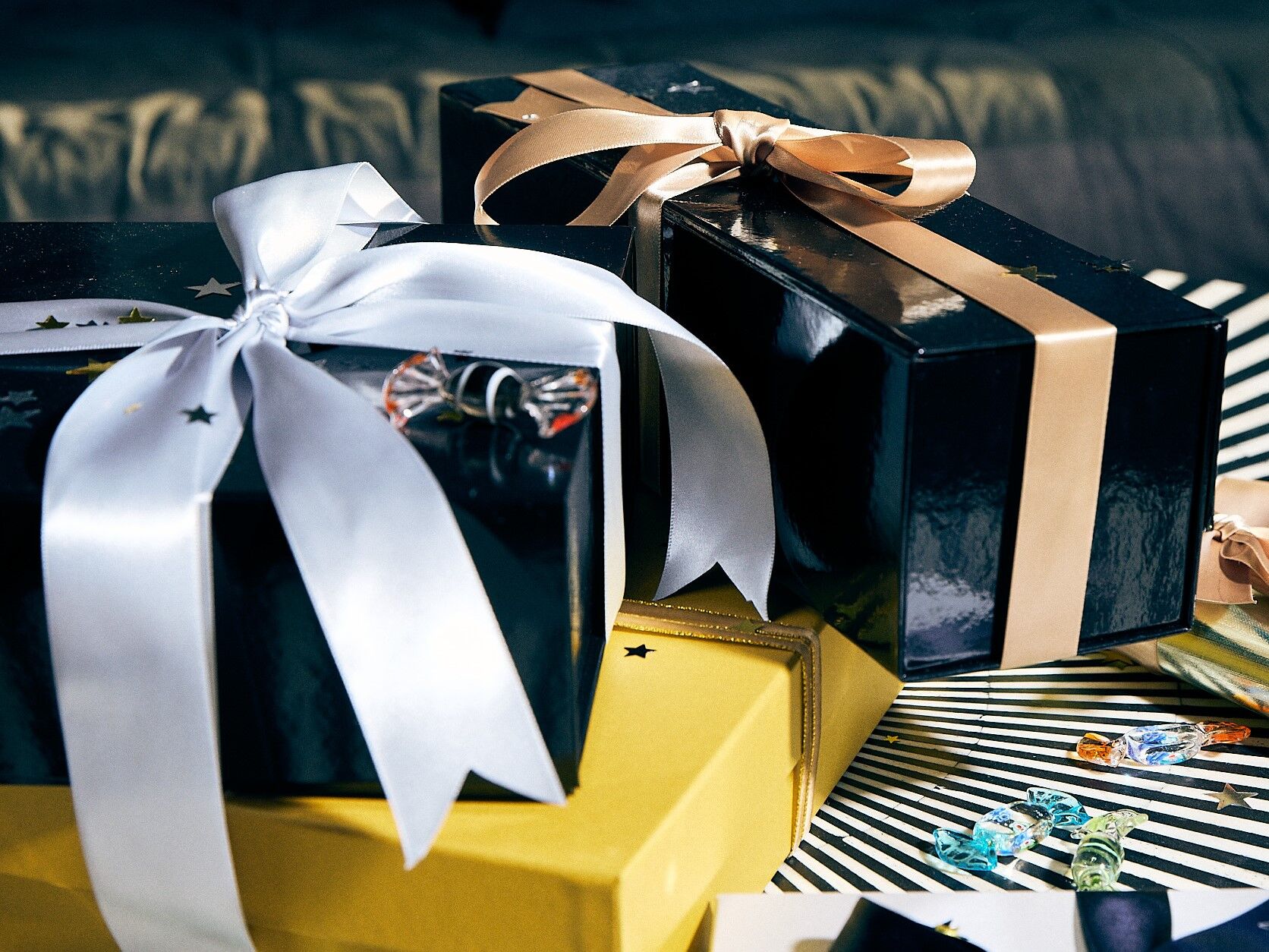 Wrapped presents with bows and confetti
