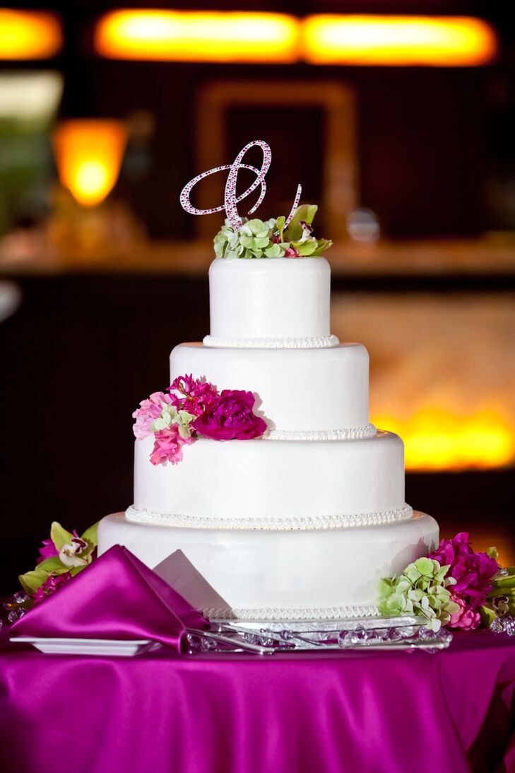 Four Tier Shimmery White Wedding Cake With Pink Monogram Cake Topper