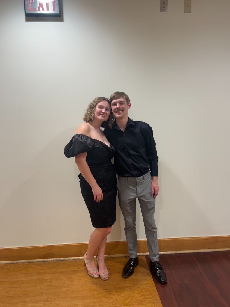 Another beautiful formal. What a mighty fine looking couple!