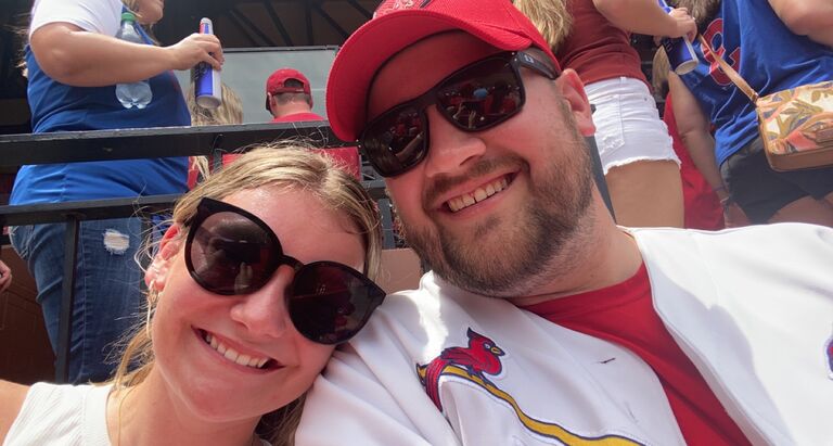 They attended their first baseball game as a couple and cheered on opposing teams. The moment was captured by taking their first selfie together to send to their moms.