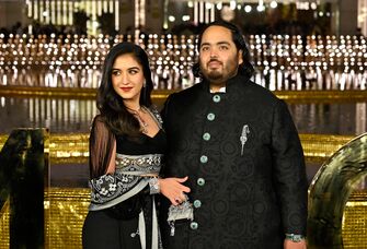 Getty Images Caption: Anant Ambani with Radhika Merchant during the inauguration of the Nita Mukesh Ambani Cultural Centre (NMACC), at Bandra-Kurla Complex (BKC), Bandra (East), on March 31, 2023 in Mumbai, India. Nita Ambani's dream project, which is housed within the Jio Global Centre in Bandra-Kurla Complex, aims to preserve and promote Indian arts. The event saw the presence of prominent celebrities and businessmen.