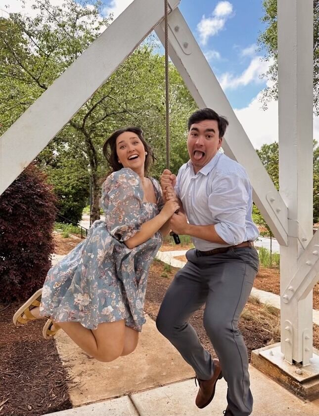 Shortly after graduation, Kyle proposed to Holly. He took Holly through North Campus to the Founders Garden. After we got engaged, we went to celebrate. To Holly's surprise, our families were waiting to celebrate with us! This was truly the best day!