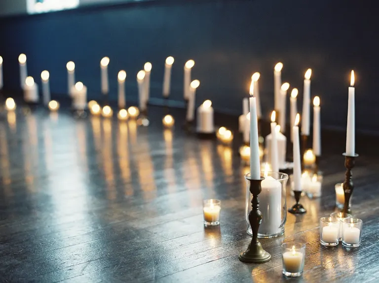 Votive Candles and White Candlesticks dark academia wedding Display