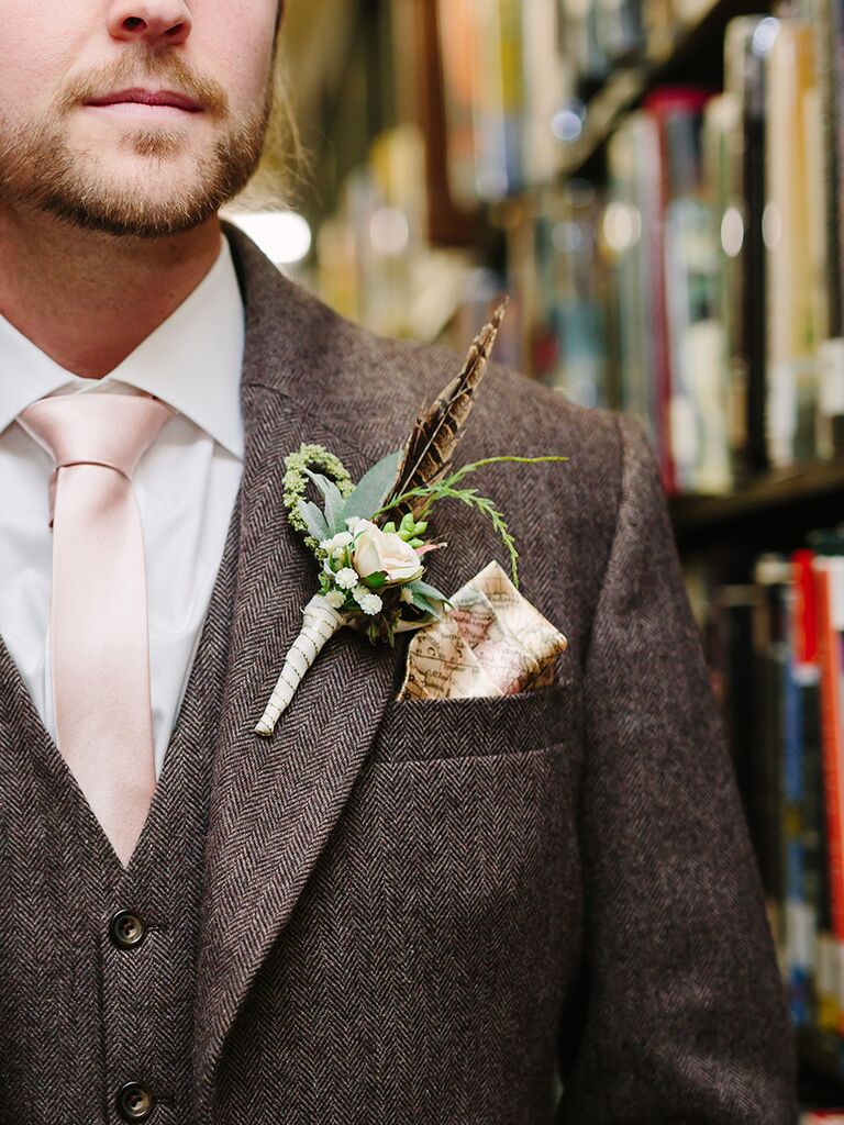 Rugged groom look with a map-themed pocket square