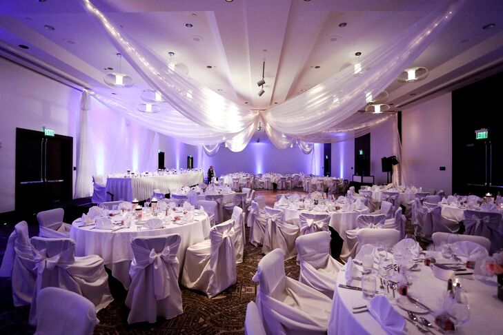 White Drapery Purple Uplighting Wedding Reception