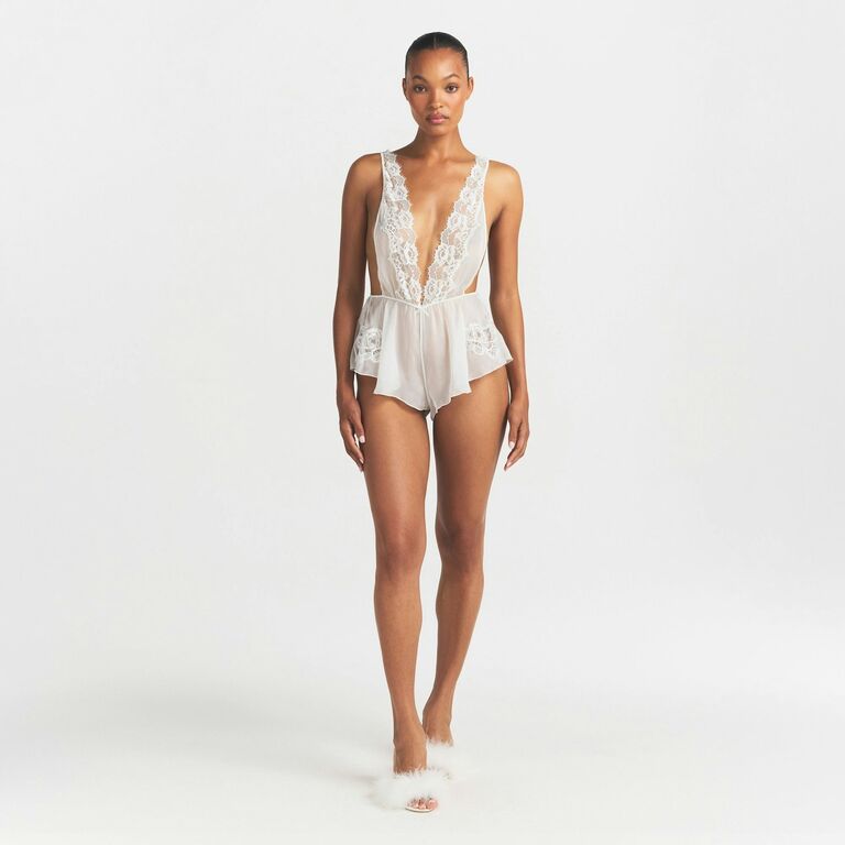 Plunge lace romper for brides