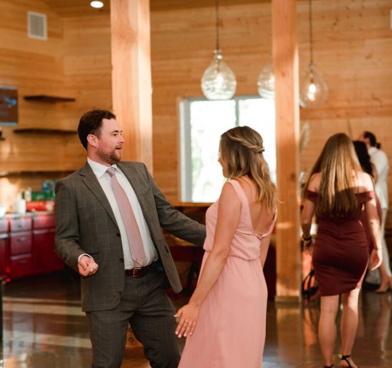 Little did Andrew and Laurel know these dance moves would come in handy for their own wedding
