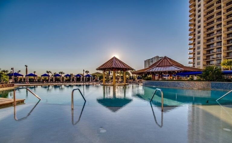 Welcome party by the pool at North Beach Resort, join us for some drinks to celebrate the start of our wedding weekend.