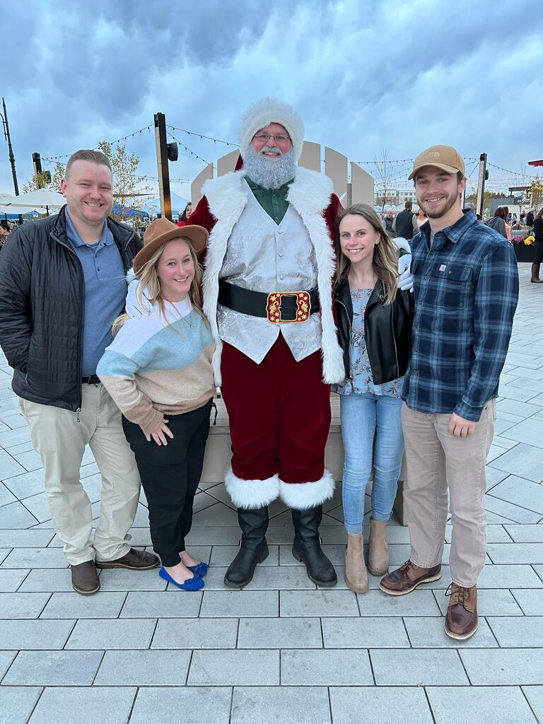 At the Tuscan Village with Casey's cousin Cassie and her husband Will