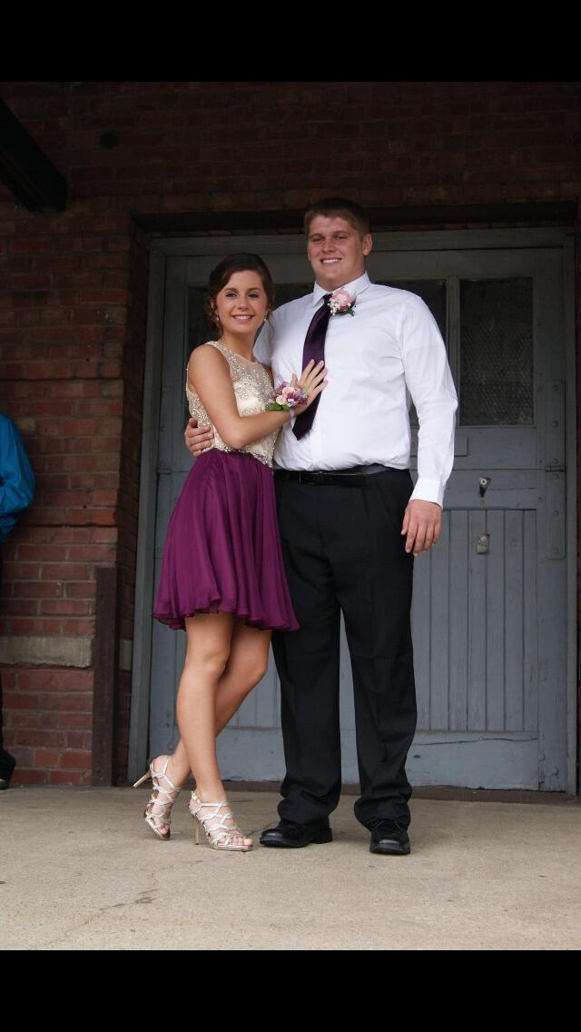 Though we have known each other since childhood, our story really began the summer before senior year when we began dating. Pictured here is our senior year homecoming, just a few months after we began dating.