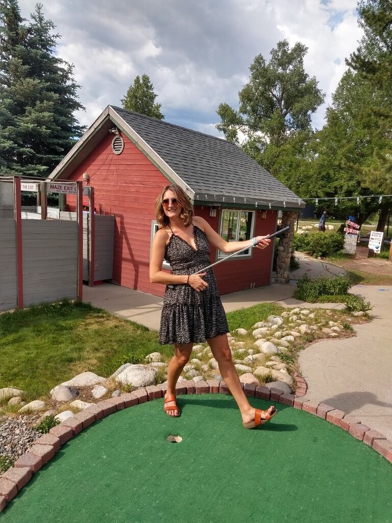 ...And she won him over with a ruthless putt putt game AND HOLE IN ONE.