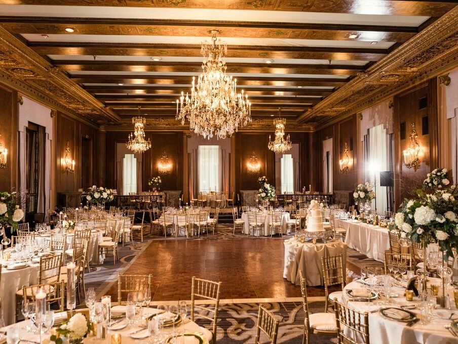 Romantic wedding event space with chandeliers and florals