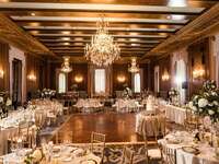 Romantic wedding event space with chandeliers and florals
