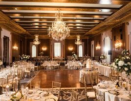 Romantic wedding event space with chandeliers and florals