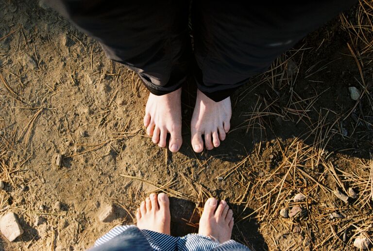 Charlie and Anelise take their first picture together... of their feet. 