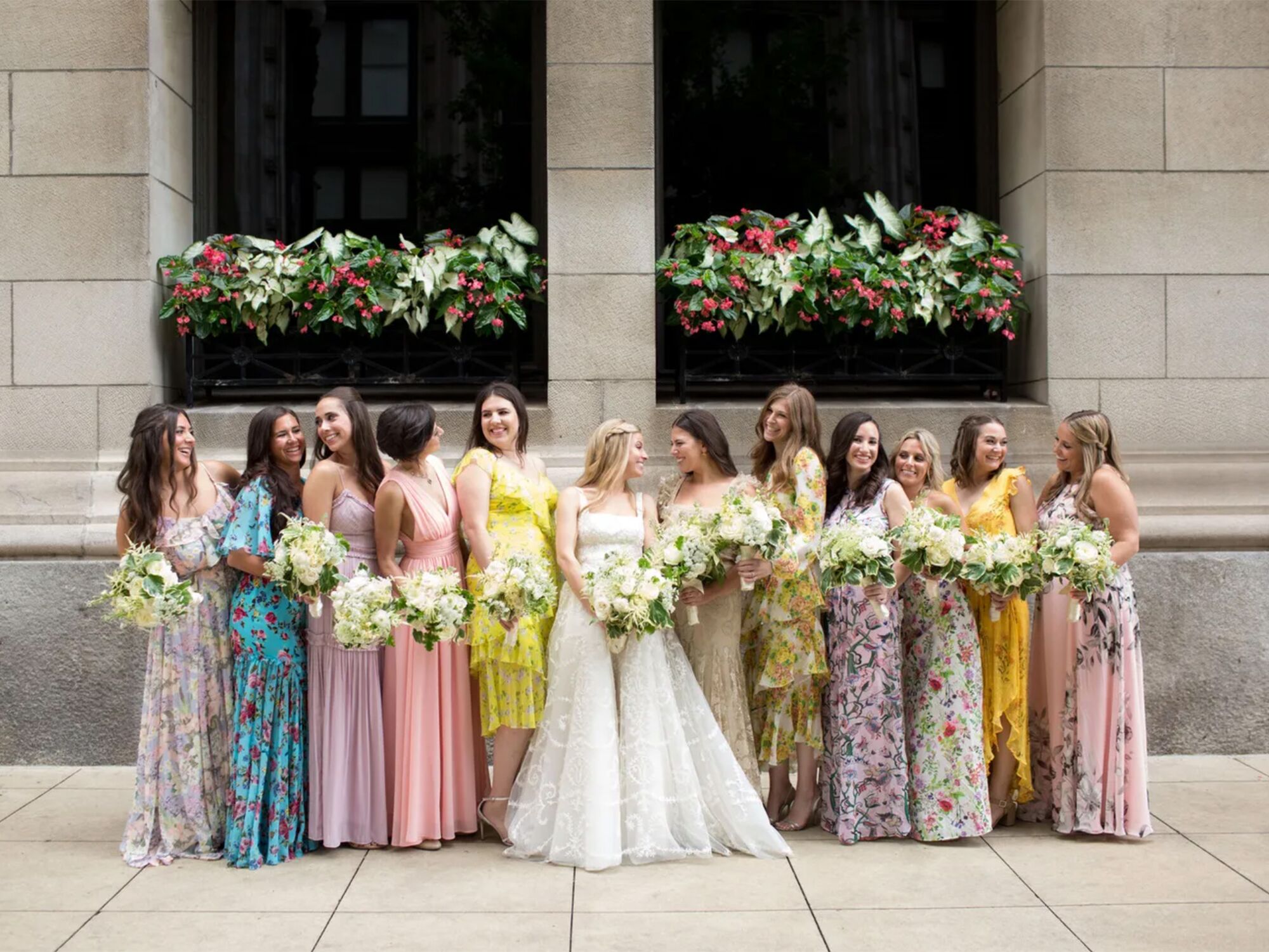 Bride and bridesmaids in spring floral dresses