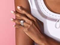 Lab grown diamond engagement ring on hand