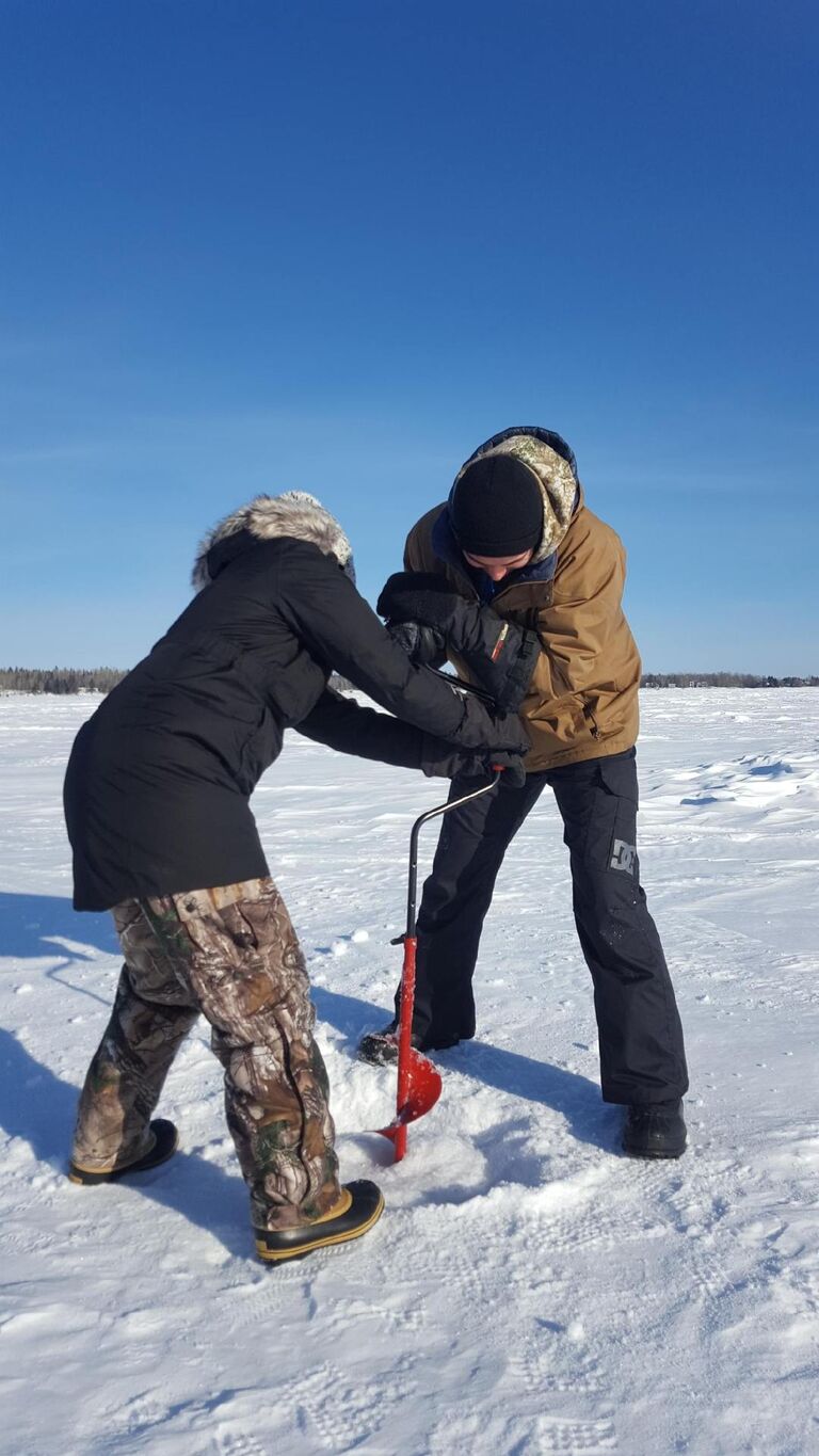 Couples who drill ice fishing holes together, stay together. 