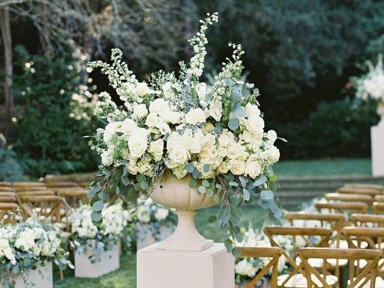 Ceremony aisle marker flower arrangement with stock, eucalyptus and rose