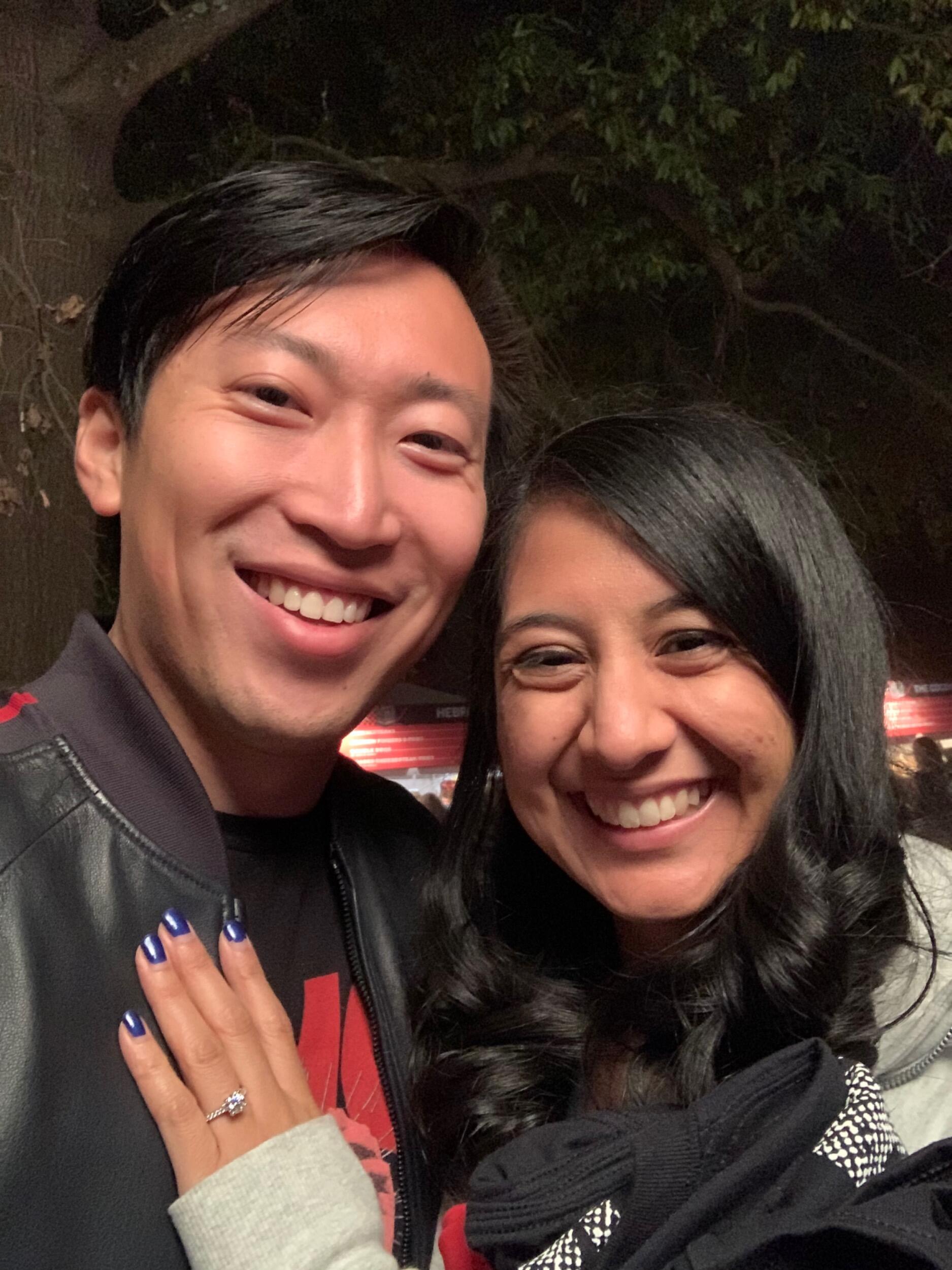 Frank proposed in the morning of Saturday  October 23rd, 2021 in Atlanta Georgia. They attended the Shaky Knees Music Festival the entire weekend. Here they took one last picture after buying some merch from their favorite band, The Strokes.