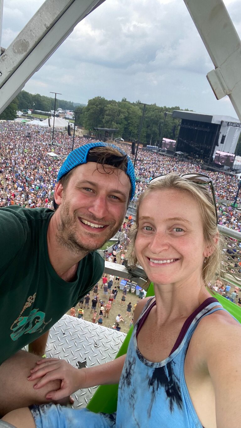 At the Mondegreen Phish festival in Dover Delaware! 

(Attending a Phish festival in Delaware was surprisingly never on Dana's bucket list - but she was pleasantly surprised and loved the whole experience!)