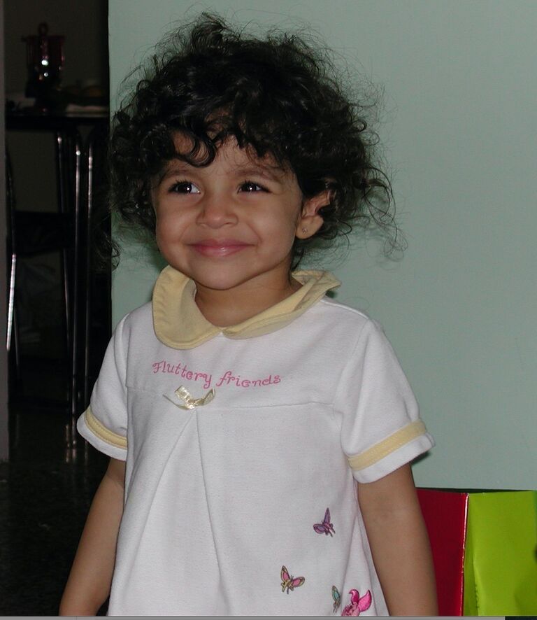 A young Sarika delighted by her latest mischief. A kid with hair like that? The chaos was inevitable…