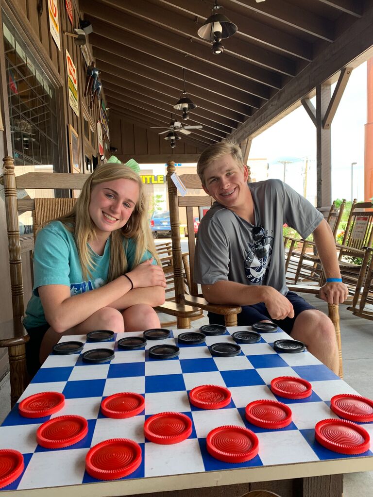 
Aubrey and Pryor first met junior year of high school. Aubrey had moved to Liberty at the start of the year and Pryor transferred in halfway through. Towards the end of their senior year, Pryor suggested in the AP English group message (shout out to Dr. Lippe) that a group should get together to skip school and support the tennis team at the state meet in Waco. Only two people responded... one of them being Aubrey! Their friendship began on the trip to Waco (this is their first picture ever taken together... at a Cracker Barrel!) and continued to blossom over the rest of their senior year. They ended up taking another trip to Waco for the track team a few weeks later, and Aubrey started attending Liberty baseball games to support Pryor! 