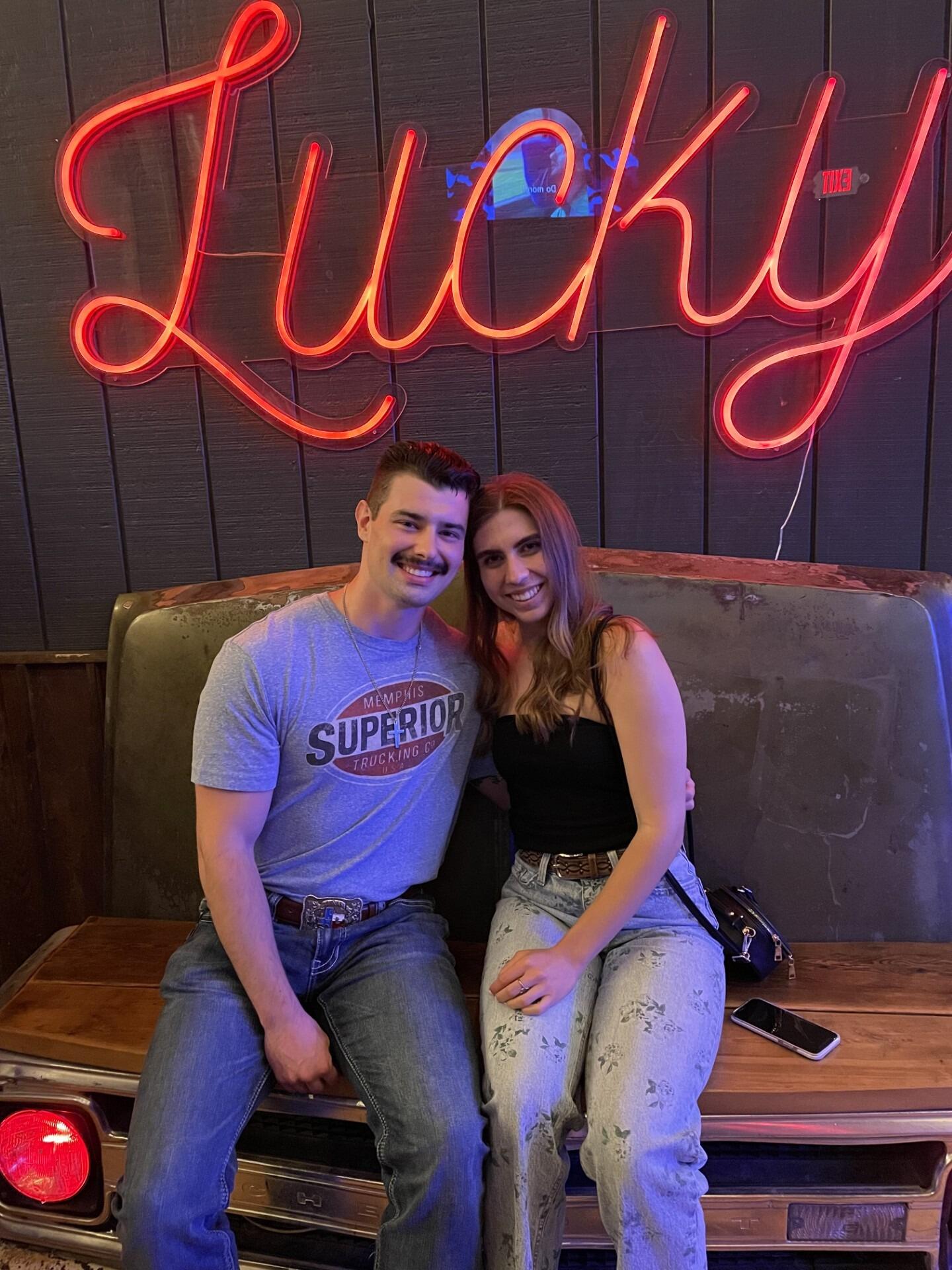 Emily and Sebastian met the old-fashioned way, at a country bar! Five days after they first met, Emily and Sebastian went on their first date at Lucky Rabbit, where they hit it off and have been together ever since. 