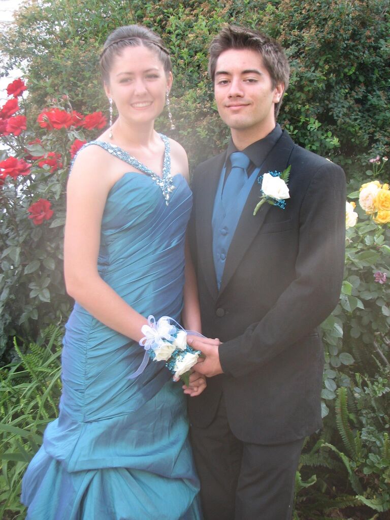 Prom: Nik senior year, Katie junior year. The Instagram caption: "PROM :D"