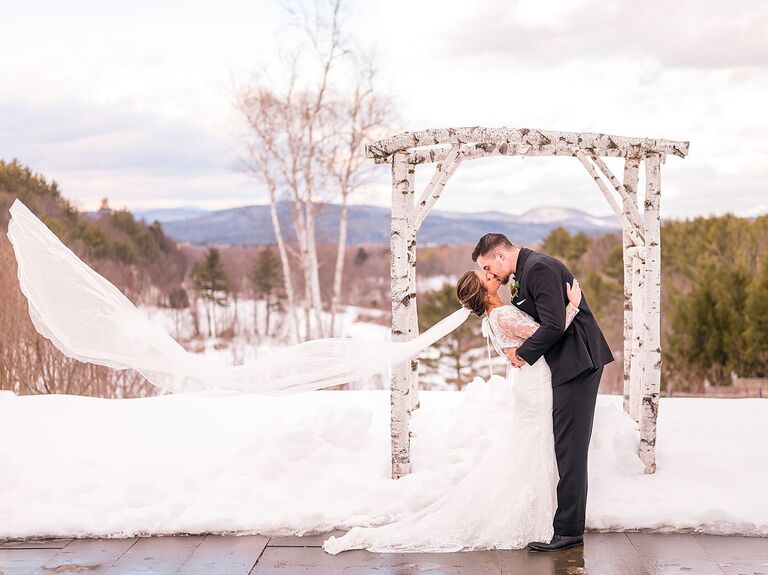 Couple kissing in a winter landscape