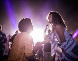 Man proposing to girlfriend at concert