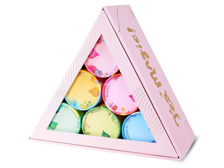 Tea gift box in light pink triangle package with gold script on side