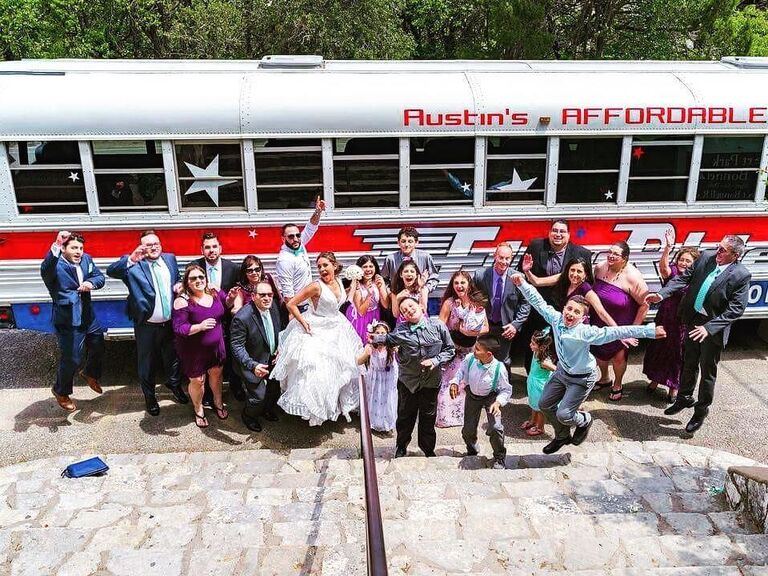 Guests celebrating outside the fly rides bus