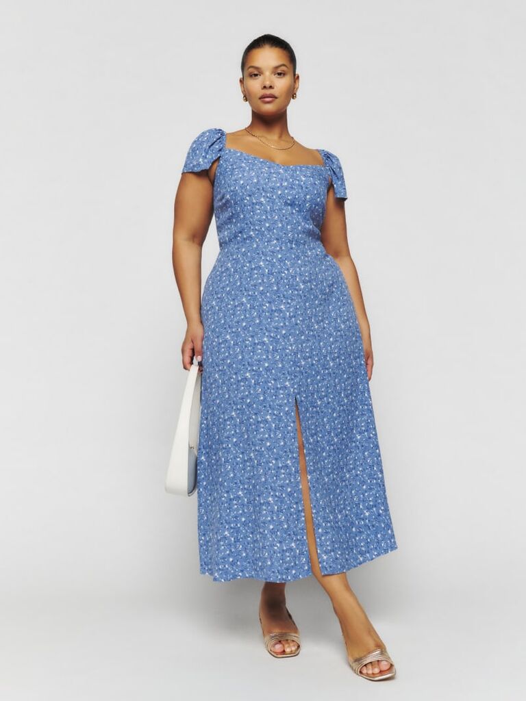 Blue floral dress for a beach wedding by Reformation. 