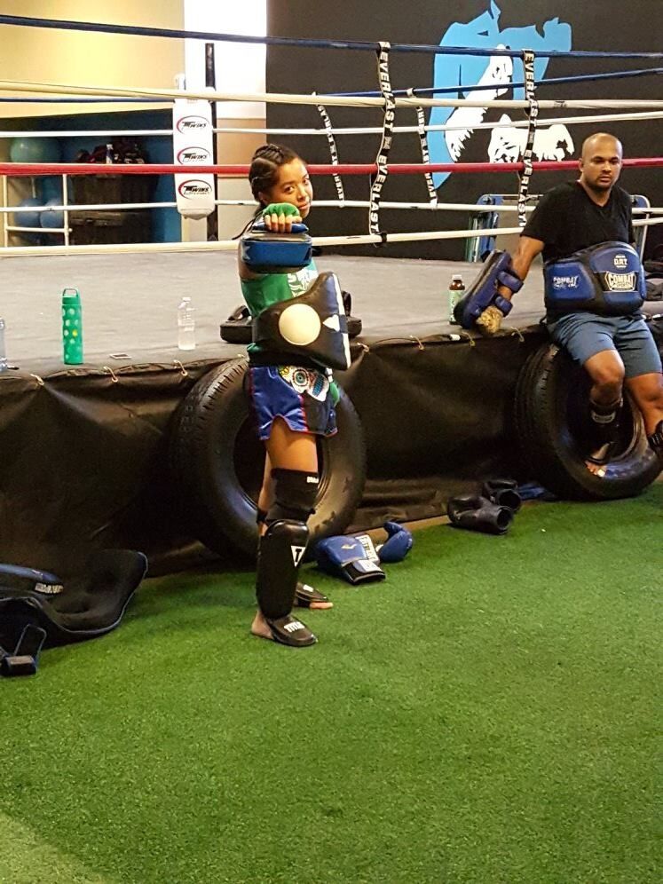 Karena taking her Level 1 test at Tampa Muay Thai.
