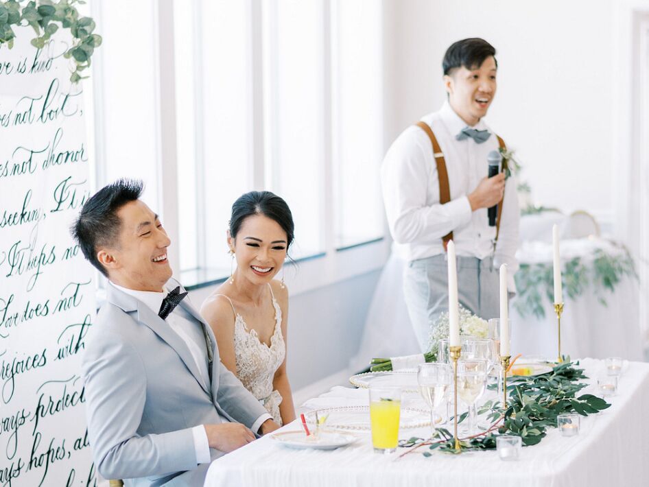 Brother of the bride giving a speech during wedding reception.