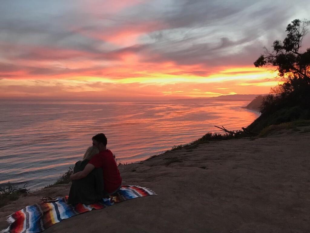 After a little over a month of texting and FaceTiming between Switzerland and California, Davide visits Breena in Santa Barbara for the first time. (A random stranger took this beautiful picture then asked if she could text it to them) This is the start of their long-distance relationship.