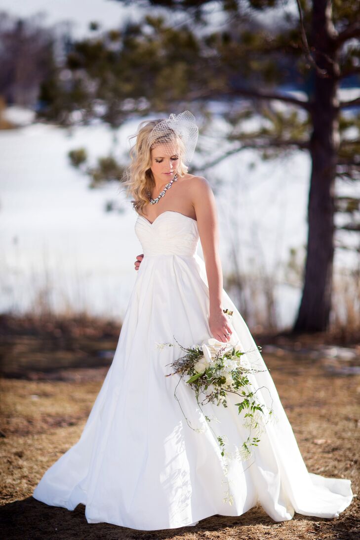 Bride In Strapless A Line Wedding Dress With Down Hairstyle