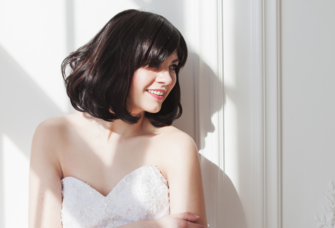 Bride with bob and bangs wedding hairstyle