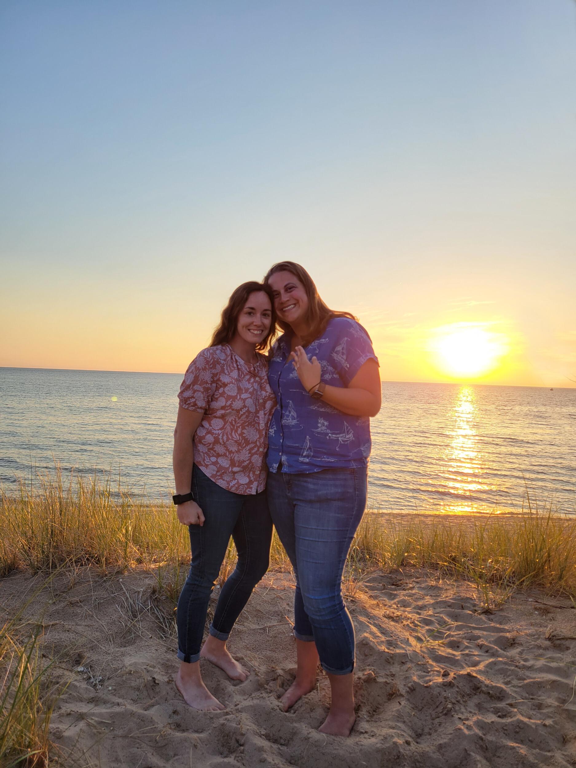 Amber proposed to Emily during sunset at Oval Beach in Saugatuck, MI.