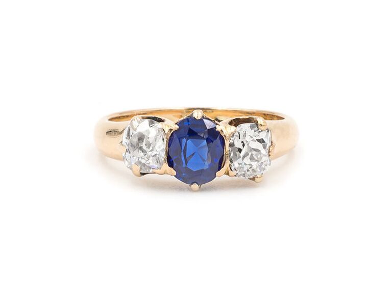 three-stone sapphire and diamond engagement ring