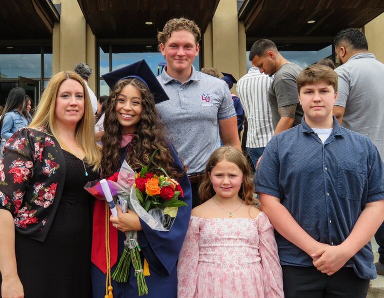 Gavin's family supporting me at my college graduation