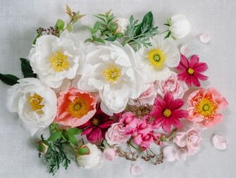 Fresh roses, cosmos and Icelandic poppies