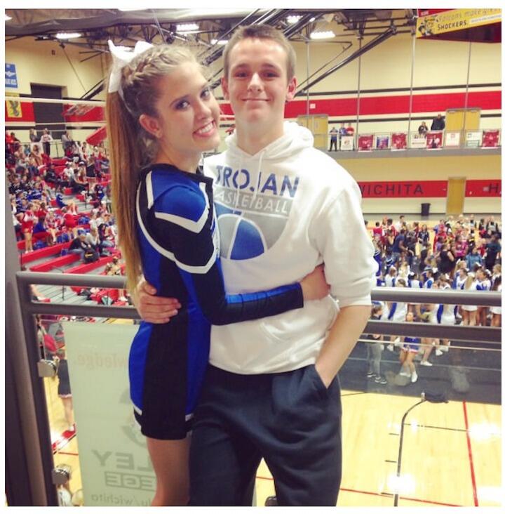 Their first picture as a couple at Ashley's cheer competition