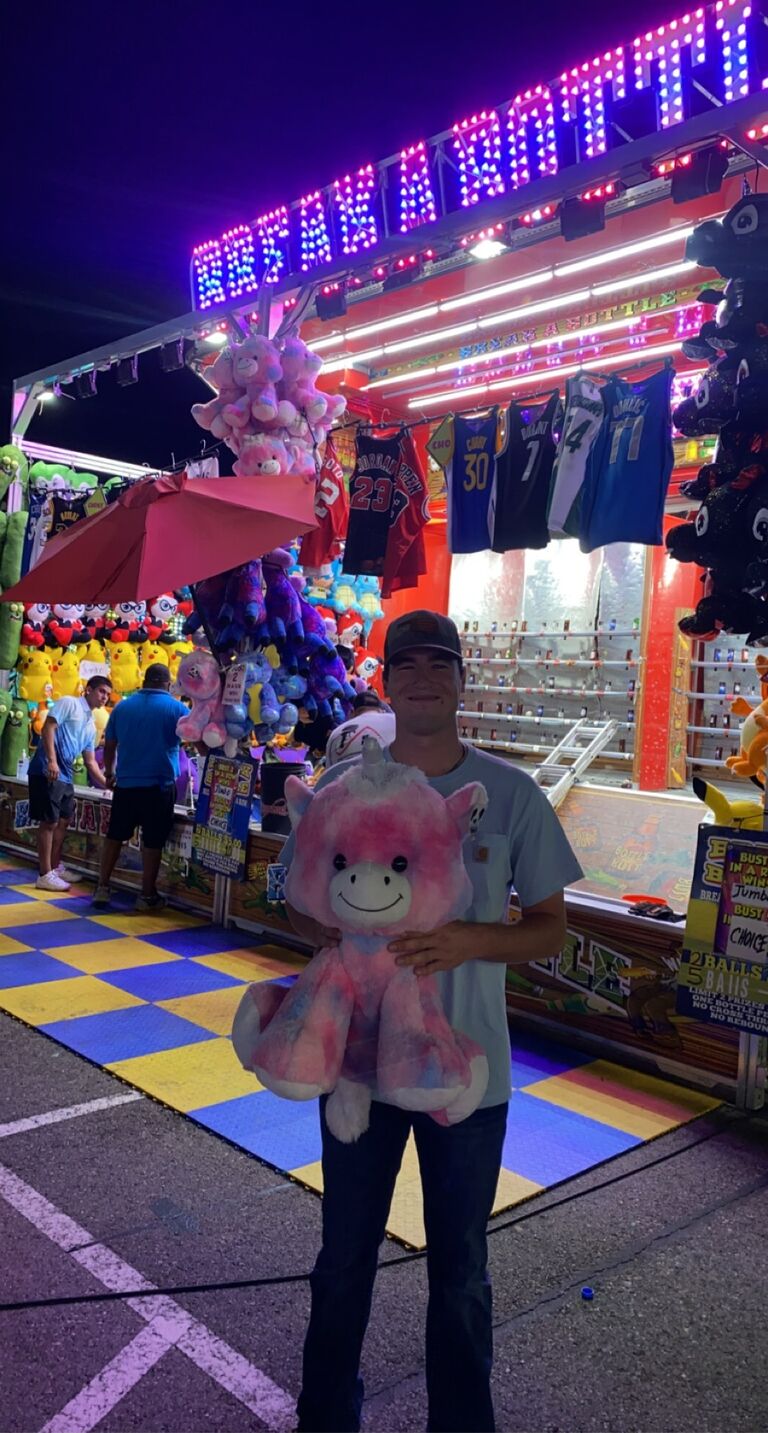Chase won Haley a sparkle unicorn at the Oklahoma State Fair