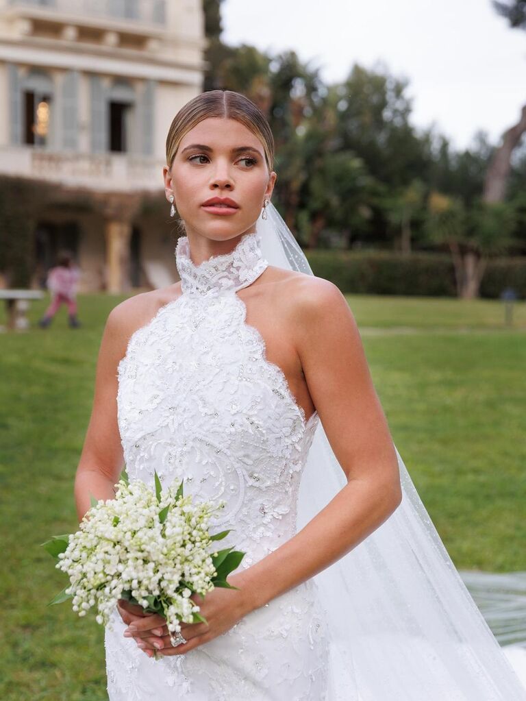 Sofia Richie wears a glamorous Chanel wedding veil. 
