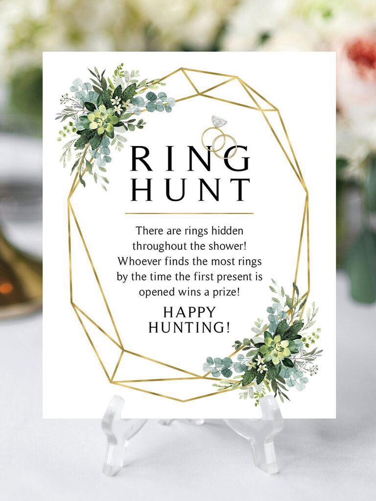 'Ring hunt' sign with gilded gold border and greenery
