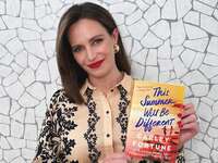 Author Carley Fortune holding her new book This Summer Will Be Different