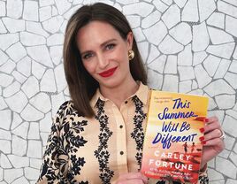 Author Carley Fortune holding her new book This Summer Will Be Different